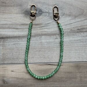 Green Beaded Phone Case Accessory with Secure Clasp